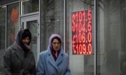 Ruble tumbles as Russia’s war economy comes under increasing strain